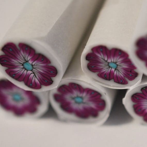 Purple and Turquois flower cane - Polymer clay cane unbaked and ready to use. Translucent background of Kato and Fimo clays.