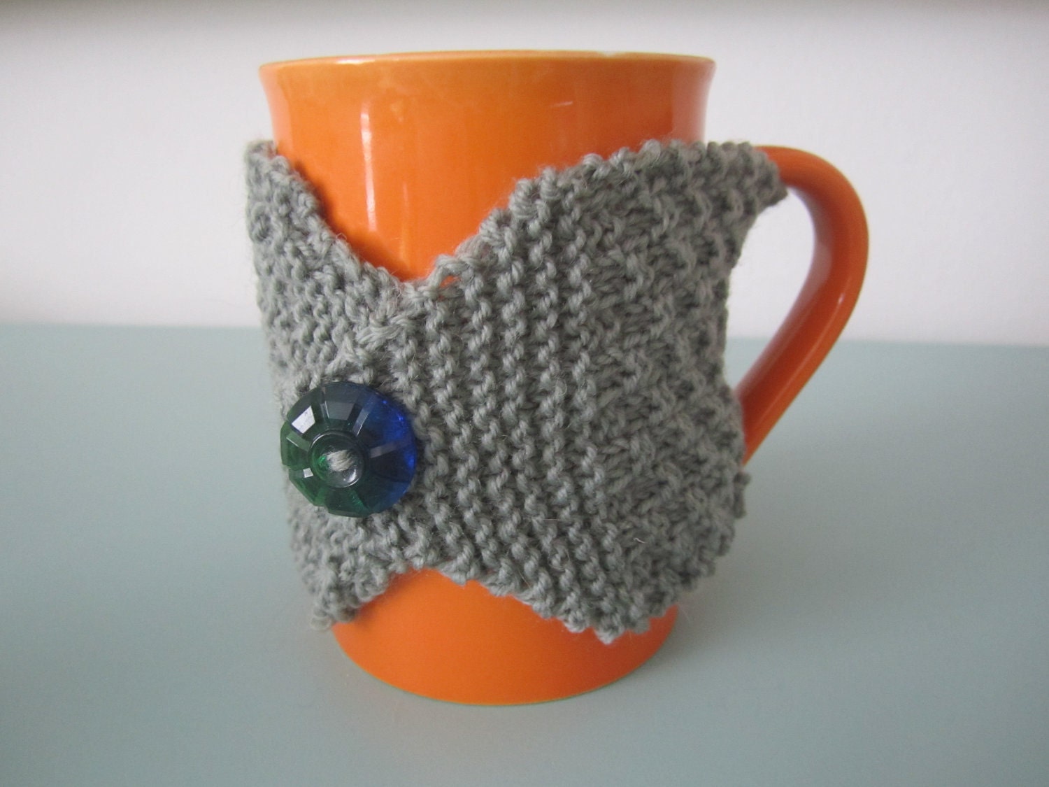 Grey hand knit coffee cup cosy mens