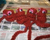 A Set of Four Red Book worm Bookmarks