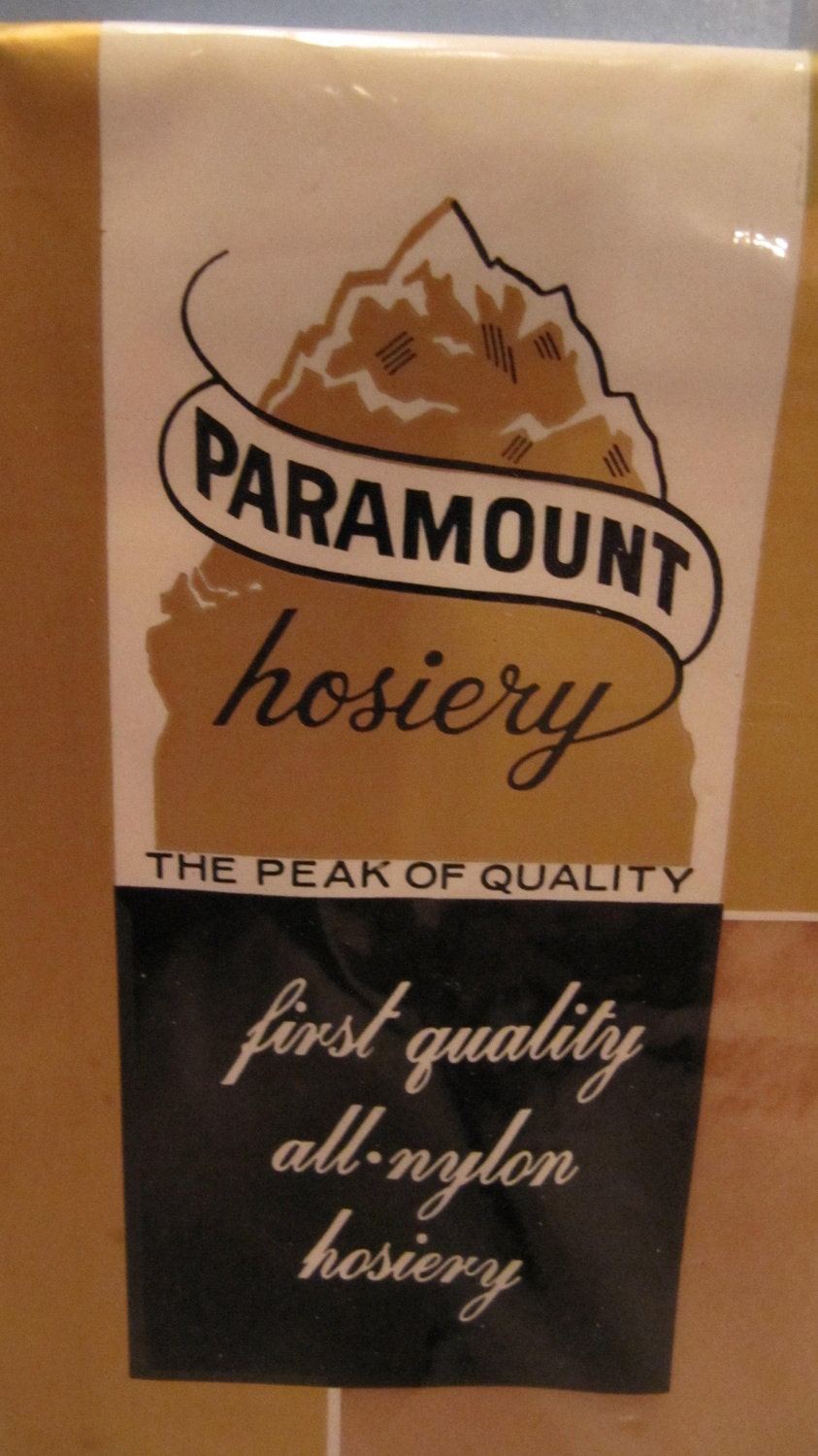 One pair of Paramount Hosiery Seamless 100 Percent Nylon Stockings in Original Packaging from the 1960s