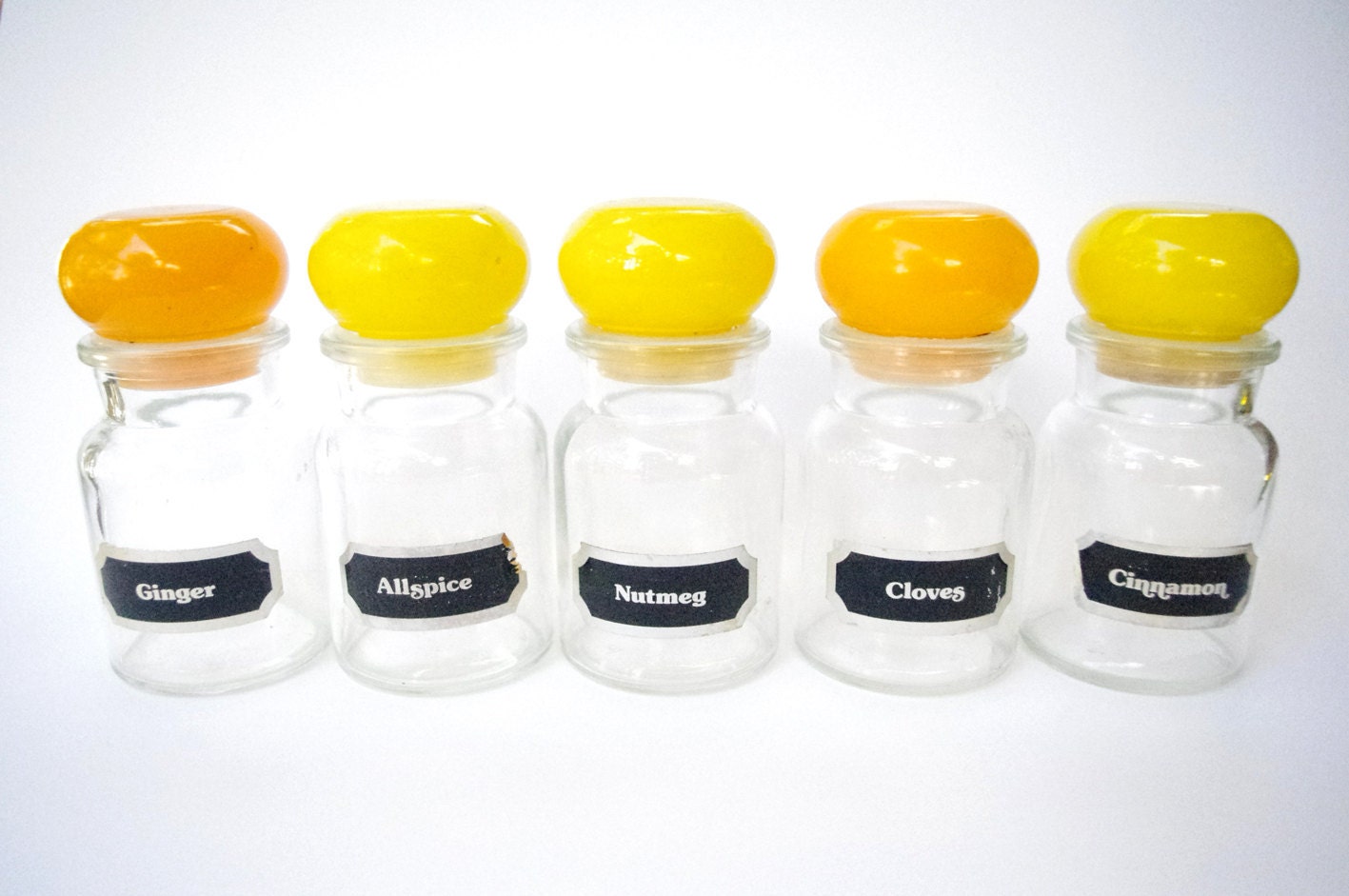 Vintage Spice Jars with Sunshine Yellow and Orange Lids and Retro Labels - thevagrantduck