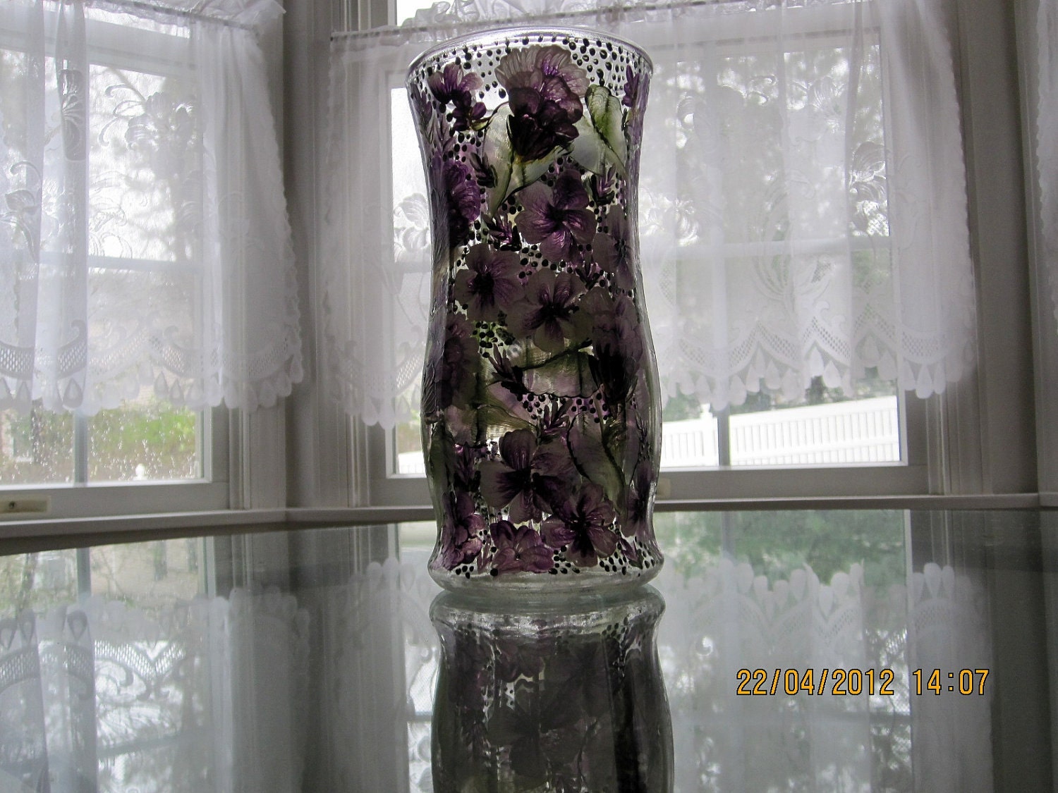 Vase with purple flowers