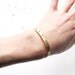 Thin Gold Dots Cuff Bracelet / modern minimal brass jewelry / skinny hand-formed stacking bangle, pierced hole design