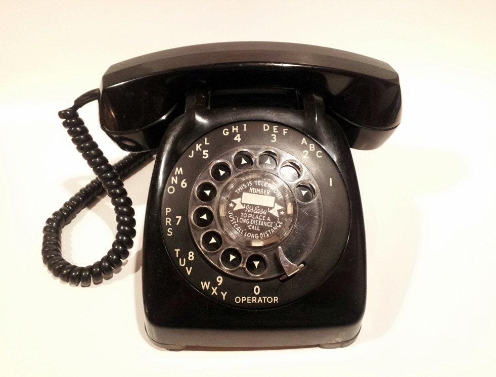 Pink and Black His-and-Hers Rotary Phones