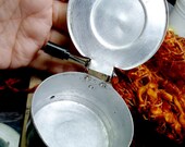 Vintage aluminium round container with mechanical opening