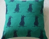 Cockatoo on Jade in purple - handprinted cushion cover
