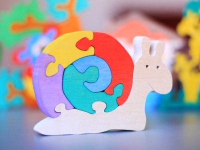Wood Colorful Puzzle SNAIL. Handmade puzzle game that develops motor skills. Kids toy. Wooden ecofriendly handmade toys for children.