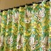 Amy Butler Shower Curtain in Water Lily Pattern in Shades of Green and White sized 72" x 72" (curtain hooks sold separately)