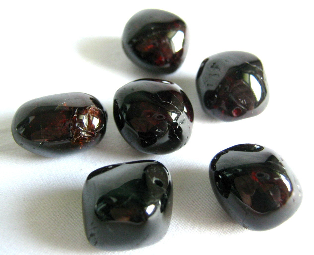 garnet beads - smooth polished 14mm average size 1/2 strand