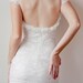 Beautiful low back French lace & silk chiffon wedding dress with capped sleeves