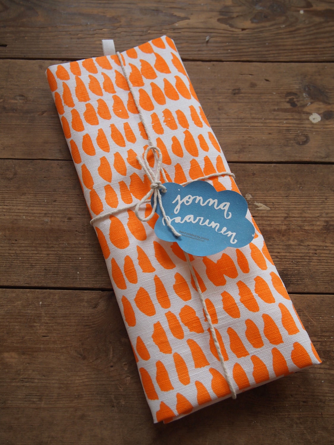 Hand printed 'Hundreds & Thousands' tea towel - orange and pink in 100% linen