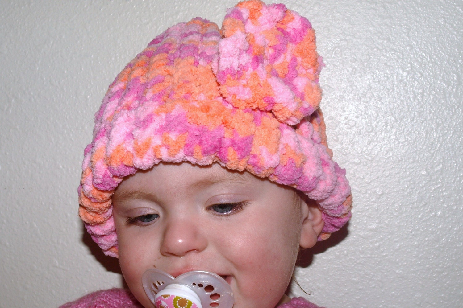 crochet hat with medium flower