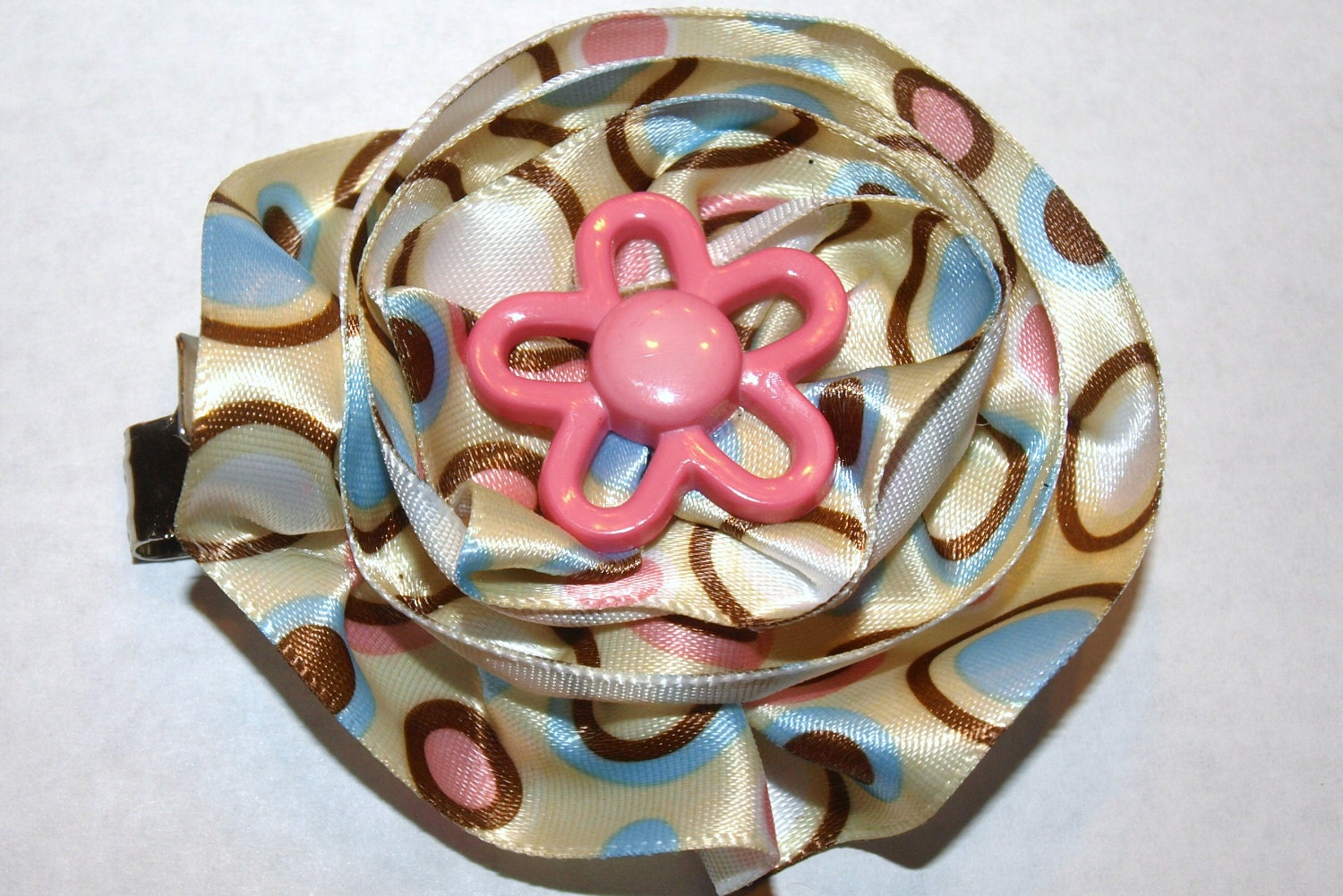 yellow, pink, and blue polka dot circle bow with flower, hairclip