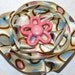 yellow, pink, and blue polka dot circle bow with flower, hairclip