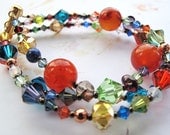 Triple strand crystal bracelet. Bakelite. Multicolor rainbow swarovski. Fashion jewelry.