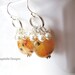 Fall fashion jewelry. Autumn spices. Pumpkin carnelian earrings with creamrose cluster of pearls. Butterscotch