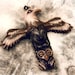 Totem pole polymer clay pendant with an eagle, a wolf and an owl, tribal pendant