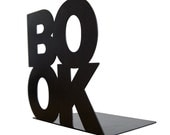 Modern stylish bookend BookOne black or white powder coated laser cut metal thick enough to hold books