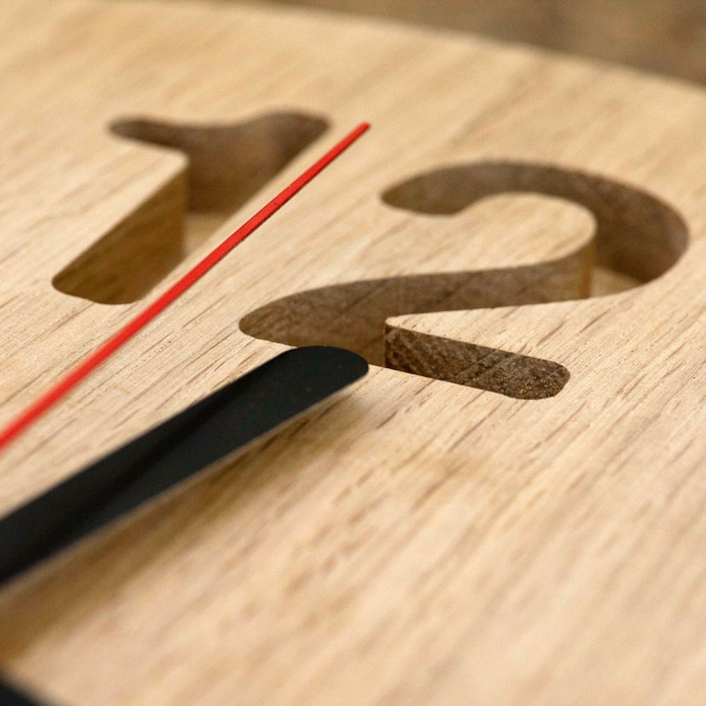 Wall clock made out of solid oak, ash or maple, minimalistic style