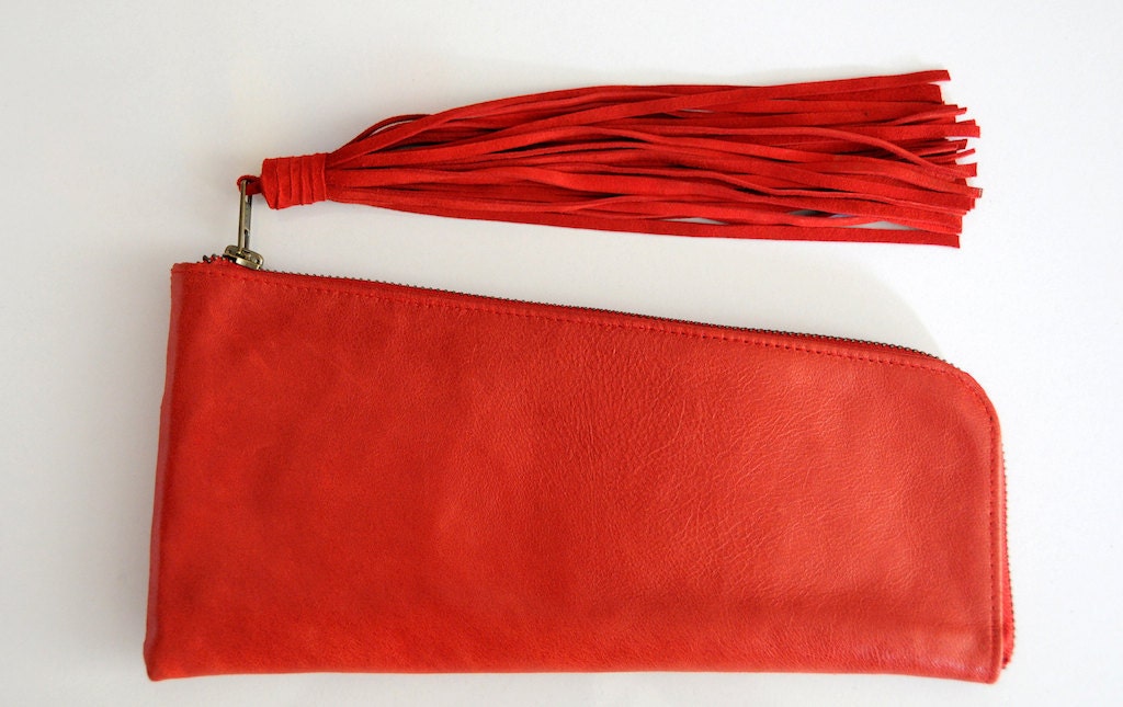 ILLUSION. Leather clutch / wallet with suede tassel. Available in different leather colors.