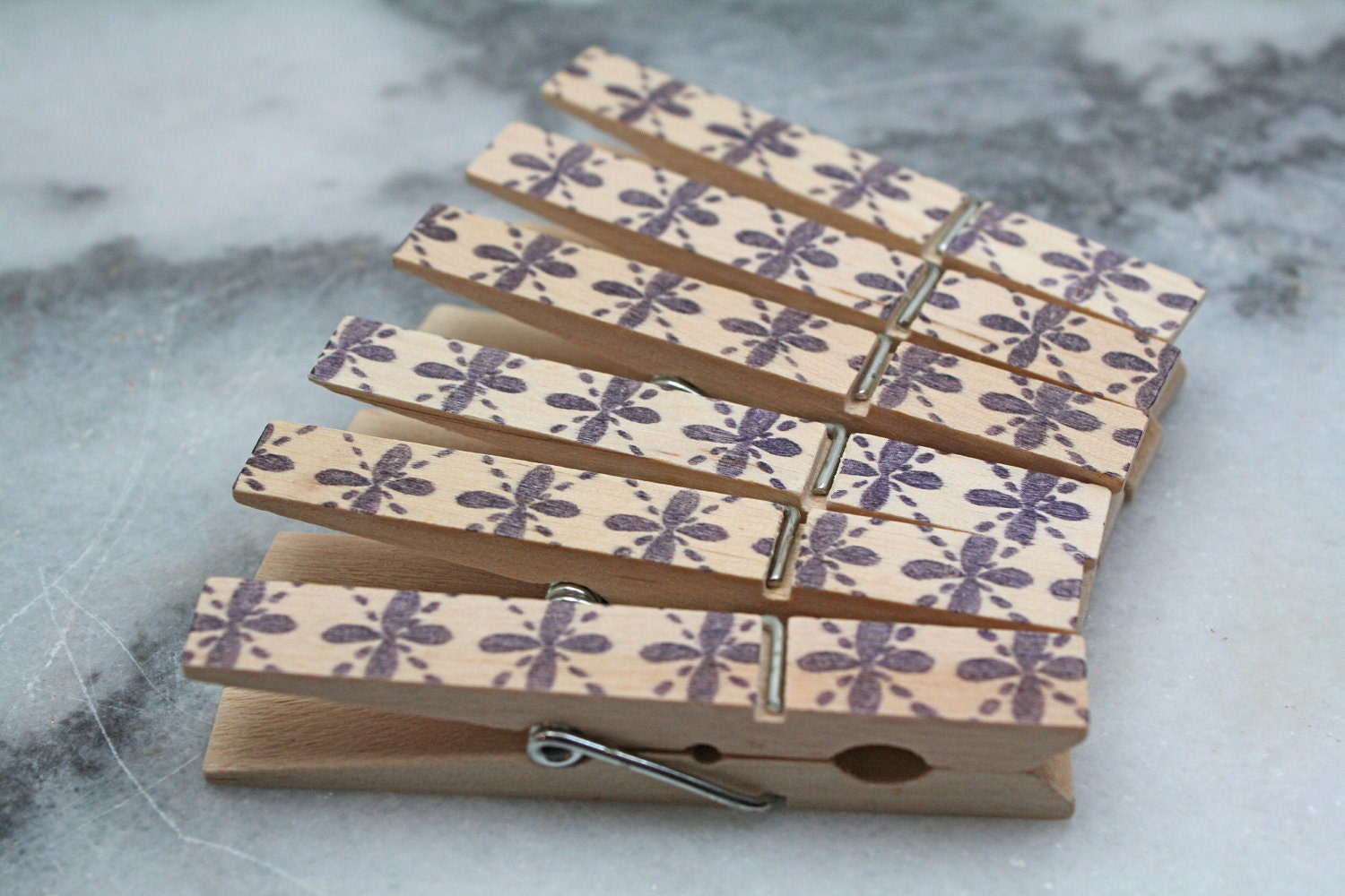 Printed clothespins, 25, royal purple floral.  Perfect wedding display for photos, seating cards, guest book alternative.