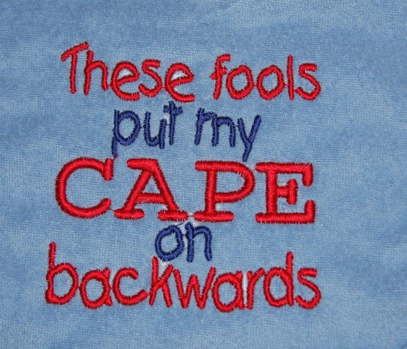 These fools put my CAPE on backwards embroidered bib