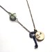 Extra Long Necklace with Green Milk Glass Accent and Skeleton Key Reclaimed Library Card Pendant