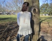 feather vest