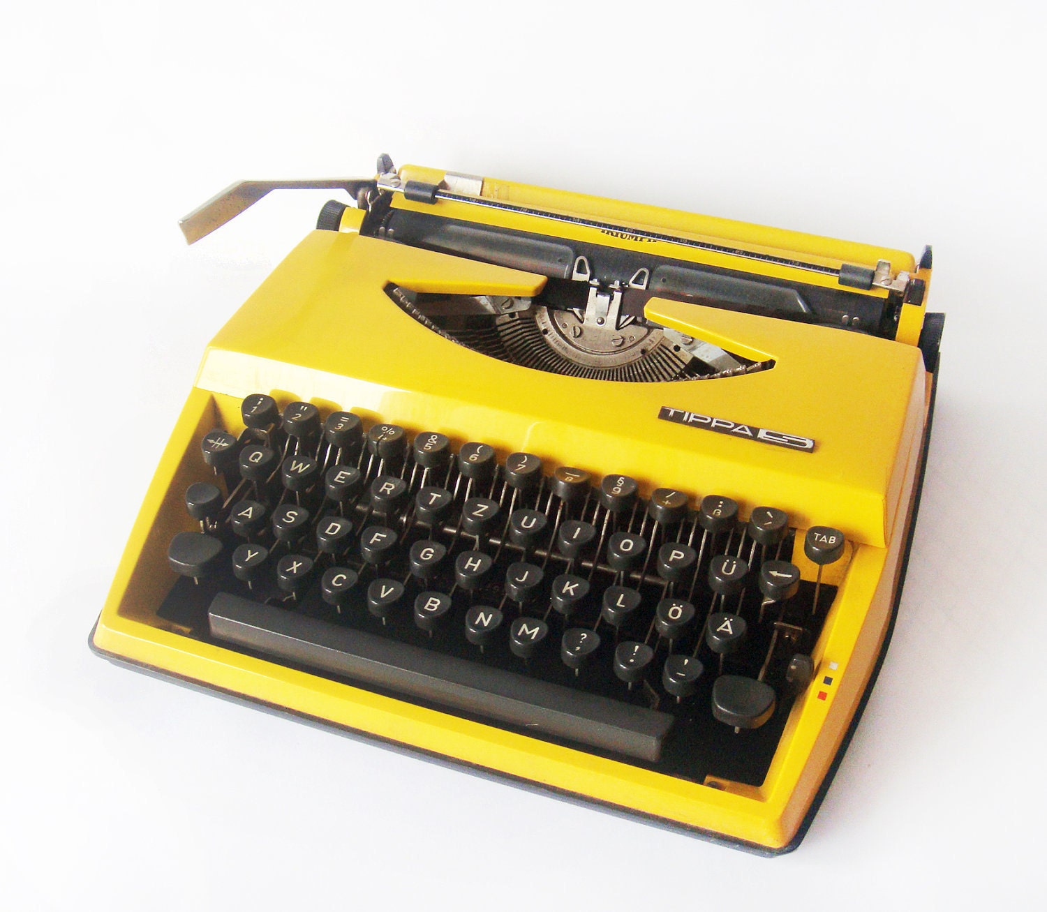 Bright Yellow Triumph Typewriter Tippa Adler - made in Holland - manual retro Typewriter