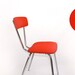 SOLD - 4 dining chairs - pink / orange / yellow / red - steel base