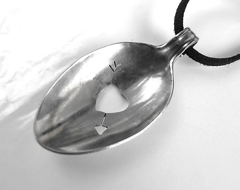 Stainless steel spoon pendant on black suede cord. Hand cut heart with arrow