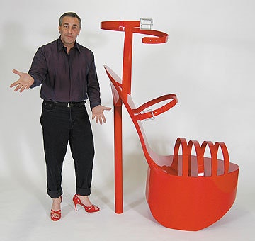 Giant 6 foot tall red stiletto high heel shoe sculpture in painted steel