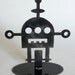 Robot 5 - modern table top robot sculpture in steel