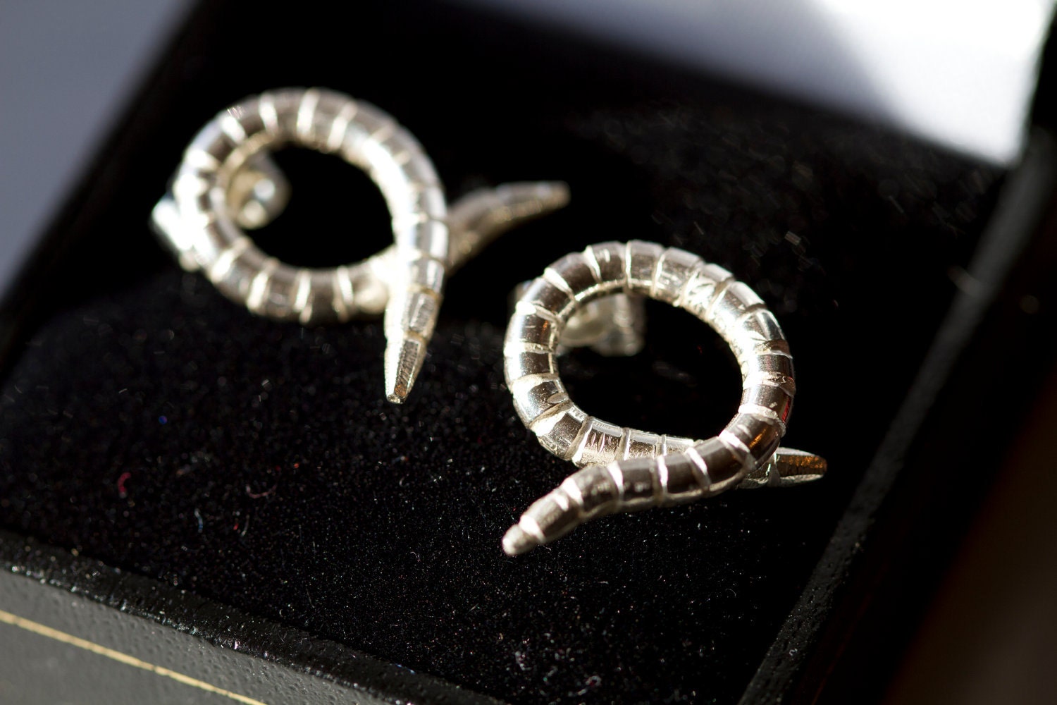 Silver worm earrings