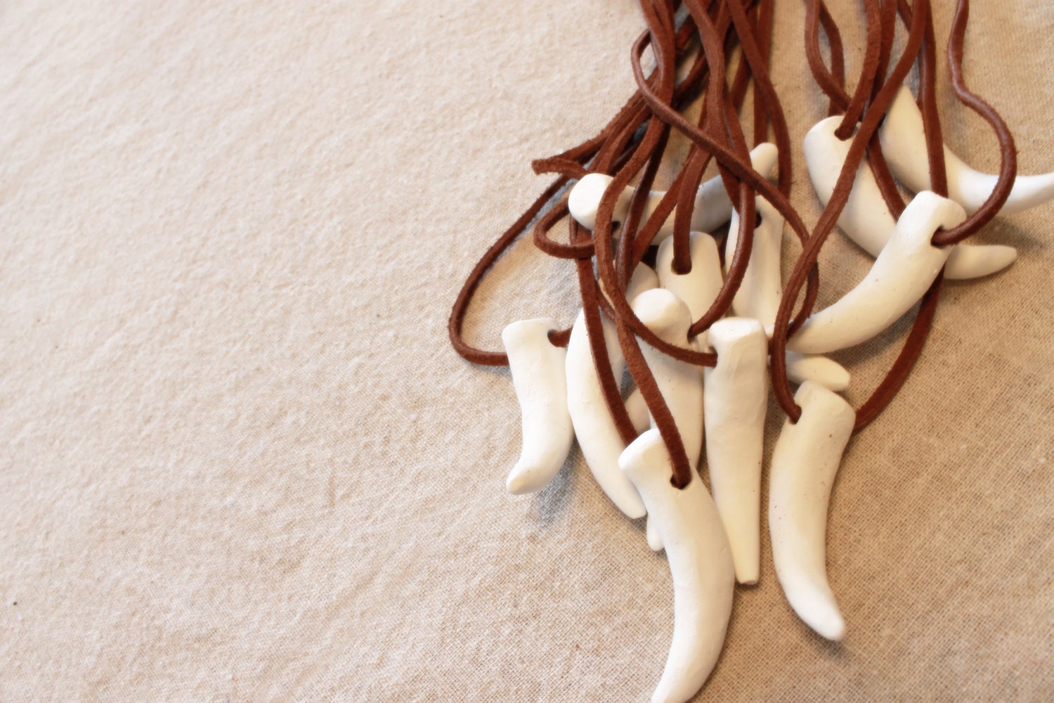 http://www.etsy.com/shop/whirligigspartyco?ref=seller_info 6 Clay Tooth Necklaces - Dragon or Dinosaur Party Favors
