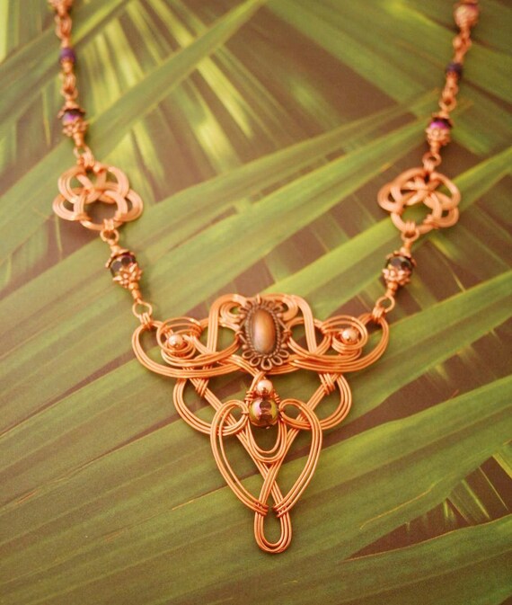 Copper Wire-wrapped Celtic Styled Necklace With Amethyst, Copper and Faceted Irridescent Beads.