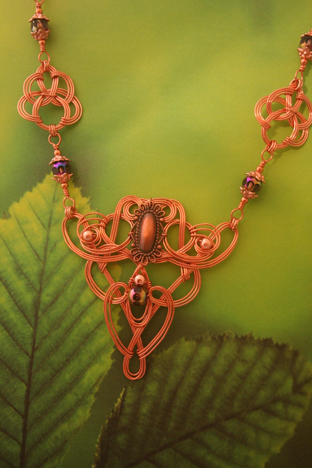 Copper Wire-wrapped Celtic Styled Necklace With Amethyst, Copper and Faceted Irridescent Beads.