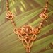 Copper Wire-wrapped Celtic Styled Necklace With Amethyst, Copper and Faceted Irridescent Beads.
