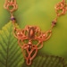 Copper Wire-wrapped Celtic Styled Necklace With Amethyst, Copper and Faceted Irridescent Beads.