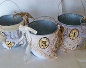 Being held reserved Galvanized metal bucket set embellished number tags muslin and lace home decor anita spero