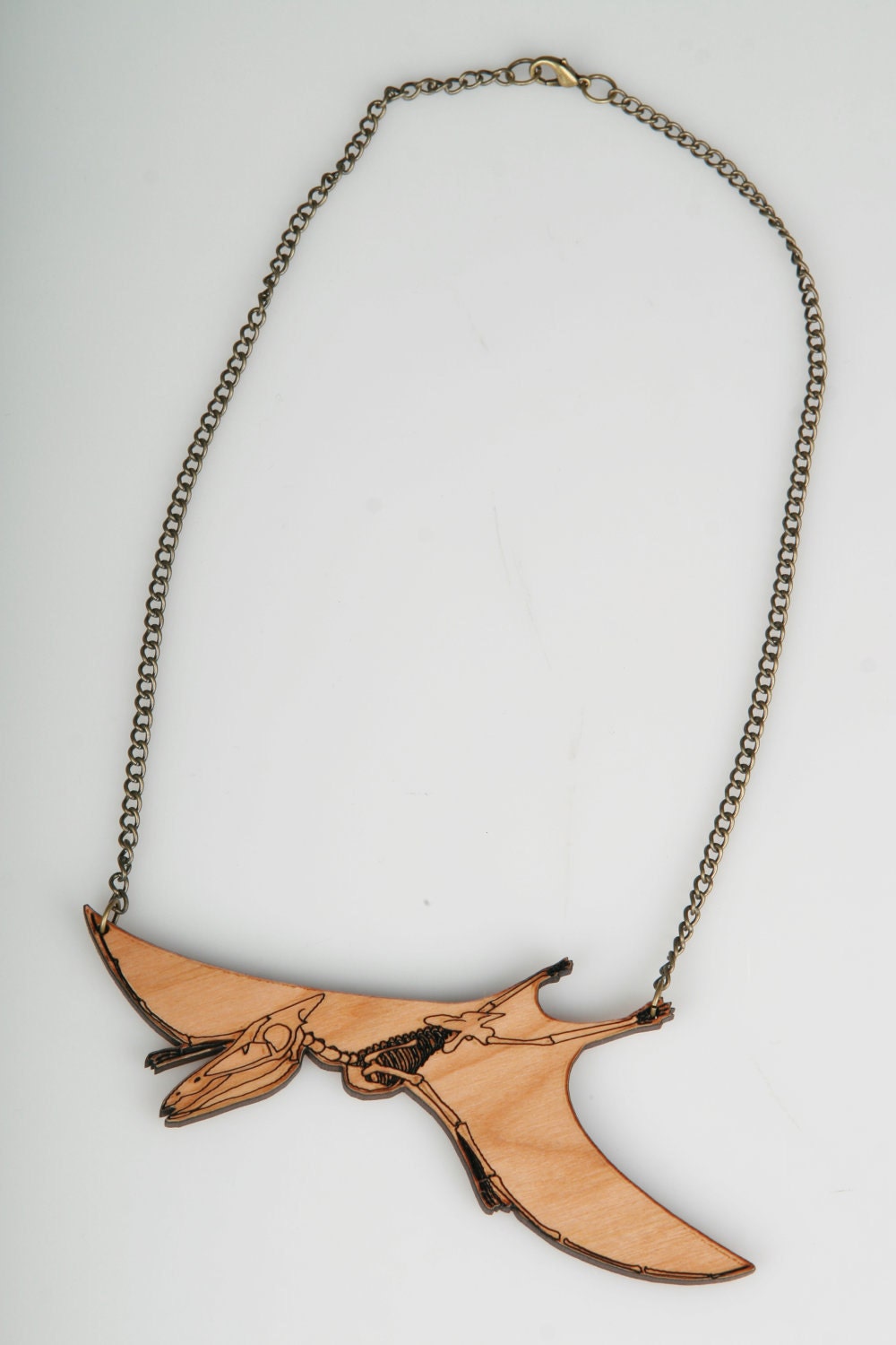 Skeleton Pterodactyl Necklace. Laser Cut Wooden Dinosaur Necklace. Cherry Wood.