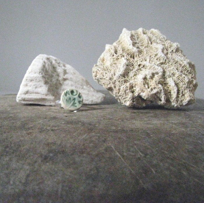 handmade ceramic ring, soft green and stone, floral patterns