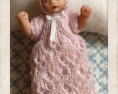 Handmade qute dollhouse porcelain babygirl doll in scale 1:12 wiht handknitted pink bonnet and christening gown. - minis2you