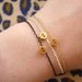 Tiny Skull Bracelet - Matt 14k Gold Plated Skull Charm on Gold Delicate Chain with Mint Faceted Bead