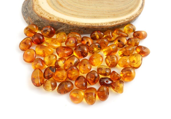 Natural Baltic Amber polished rounded  beads - 50 pcs - Cognac