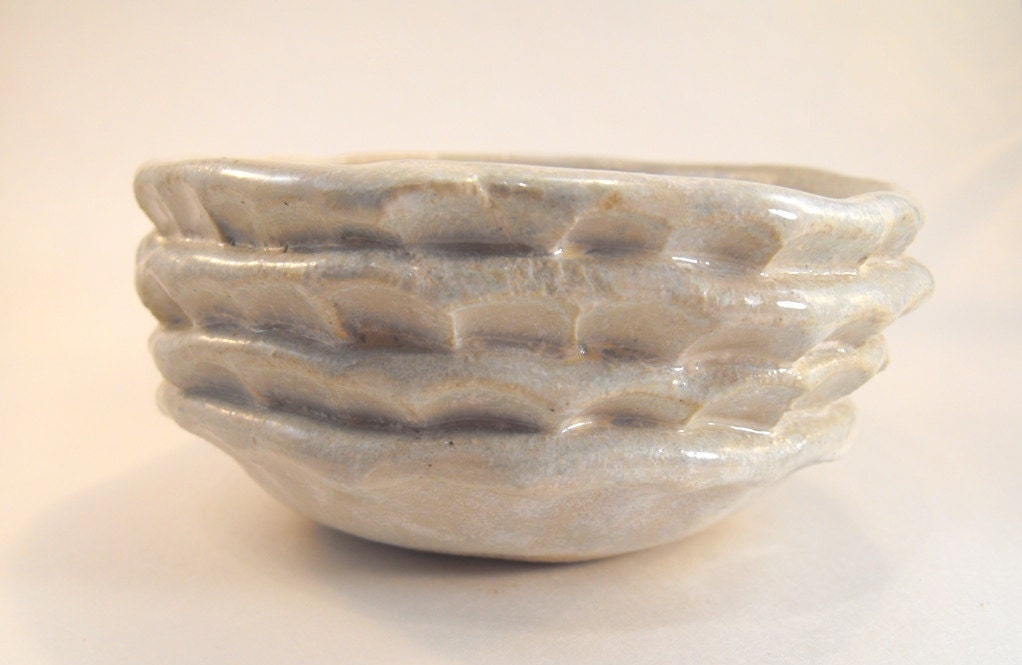 stoneware, pottery. cream/nougat/white bowl for side dish, yogurt or ice cream.