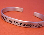 Les Miserables Inspired - There Is A Flame That Never Dies - A Hand Stamped Aluminum Bracelet