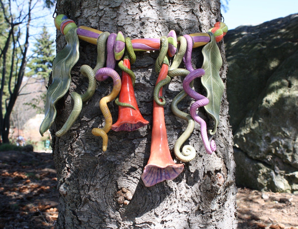 Tree Bling, orange green & mauve jewellery for your trees, handmade exotic, organic, ceramic baubles to decorate your tree trunks