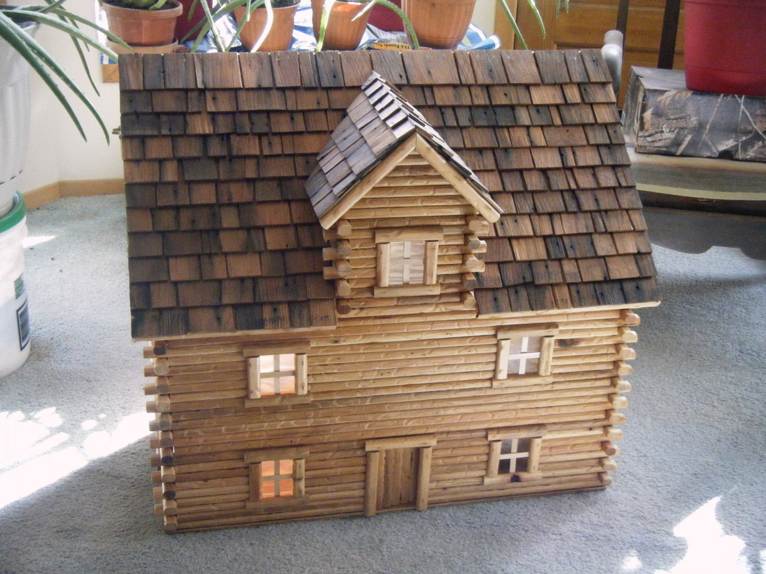 Log dollhouse
