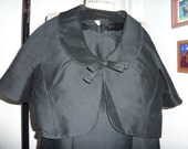 1960 Sleeveless little black dress with peter pan collar bolero with small self fabric bow. Little black dress ensemble.
